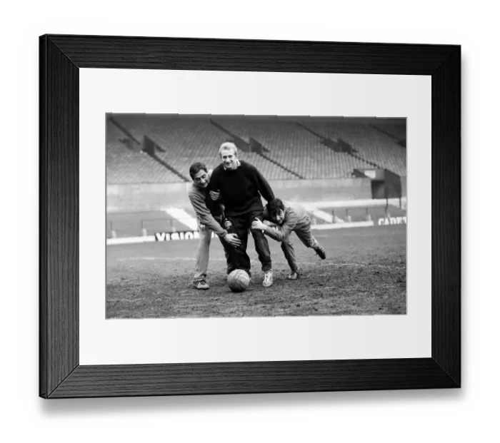 Framed Print : Manchester United Players training at Old Trafford-Dennis Law January 1967 Framed Print : Manchester United Players training at Old Trafford-Dennis Law January 1967