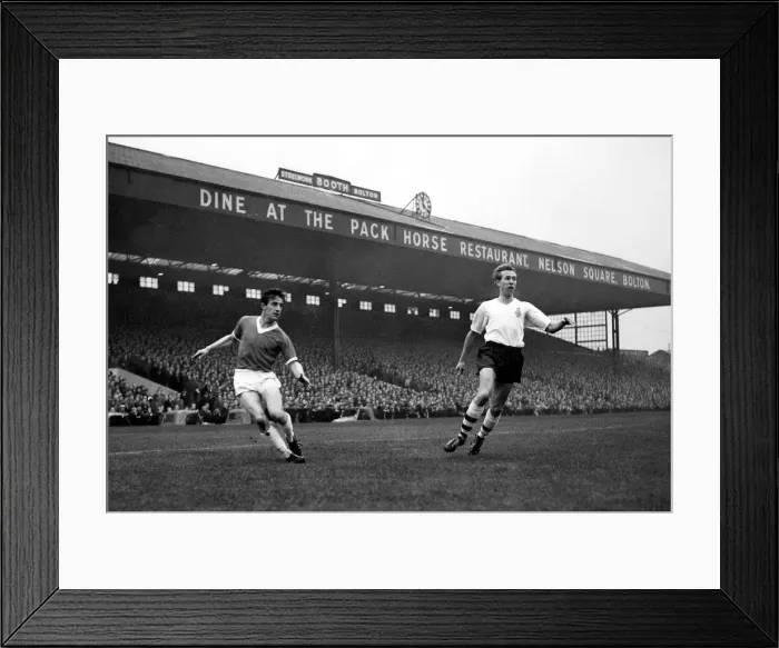 Framed Print : Manchester United forward Dennis Viollet in action during the match against Bolton Framed Print : Manchester United forward Dennis Viollet in action during the match against Bolton