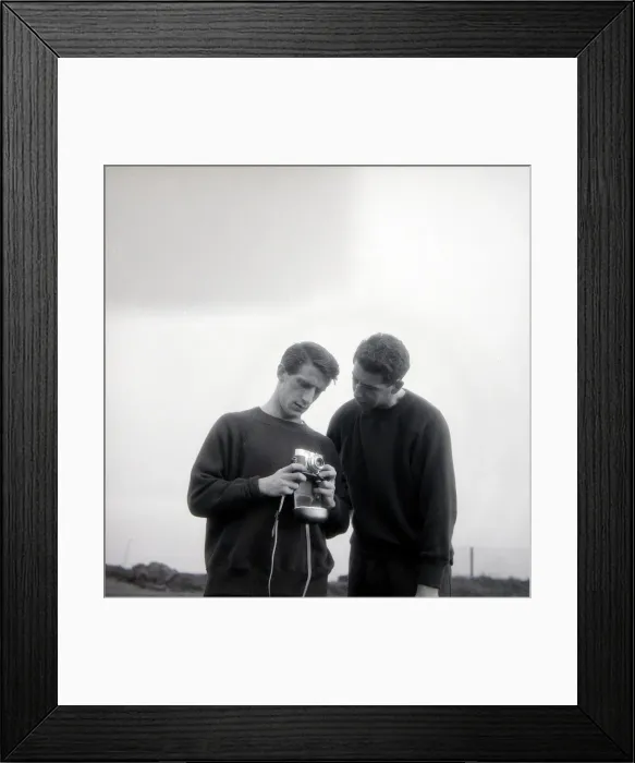 Framed Print : Manchester United players Dennis Viollet and Freddy Goodwin looking at a camera during a