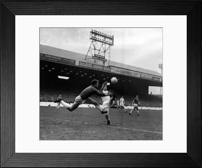 Framed Print : Manchester United goalkeeper Harry Gregg gets to the ball before Manchester City Framed Print : Manchester United goalkeeper Harry Gregg gets to the ball before Manchester City