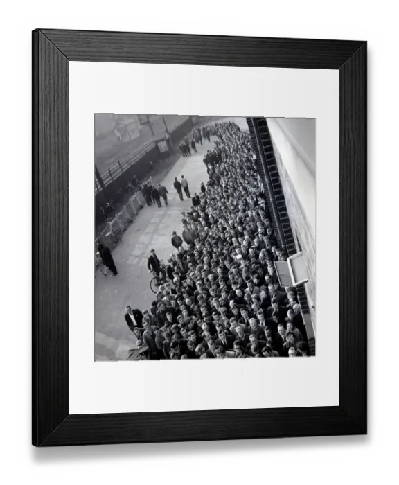 Framed Print : Manchester United fans queue for tickets at Old Trafford for the FA Cup semi final match