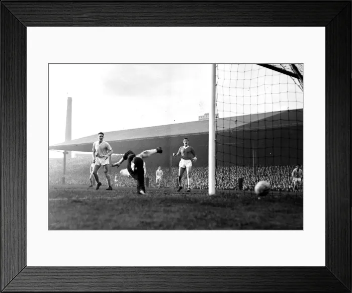 Framed Print : Manchester United goalkeper Harry Gregg saves again during a Manchester City attack in