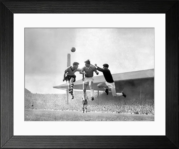 Framed Print : A misunderstanding between Cope and Harry Gregg of Manchester United nearly leads to a