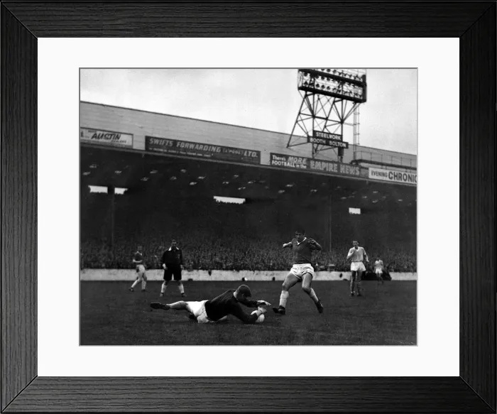 Framed Print : Manchester City goalkeeper Bert Trautmann dives and saves at the feet of Dawson of Framed Print : Manchester City goalkeeper Bert Trautmann dives and saves at the feet of Dawson of