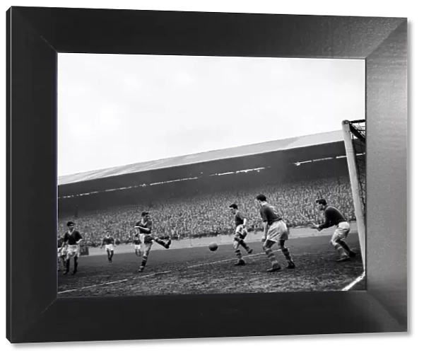 Leeds United v Manchester United Bobby Charlton shoots at goal. March 1957