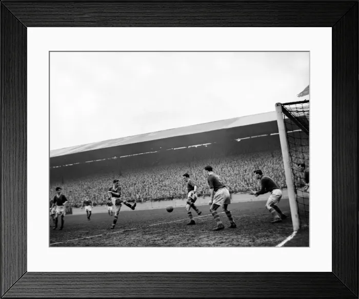 Framed Print : Leeds United v Manchester United Bobby Charlton shoots at goal. March 1957 Framed Print : Leeds United v Manchester United Bobby Charlton shoots at goal. March 1957