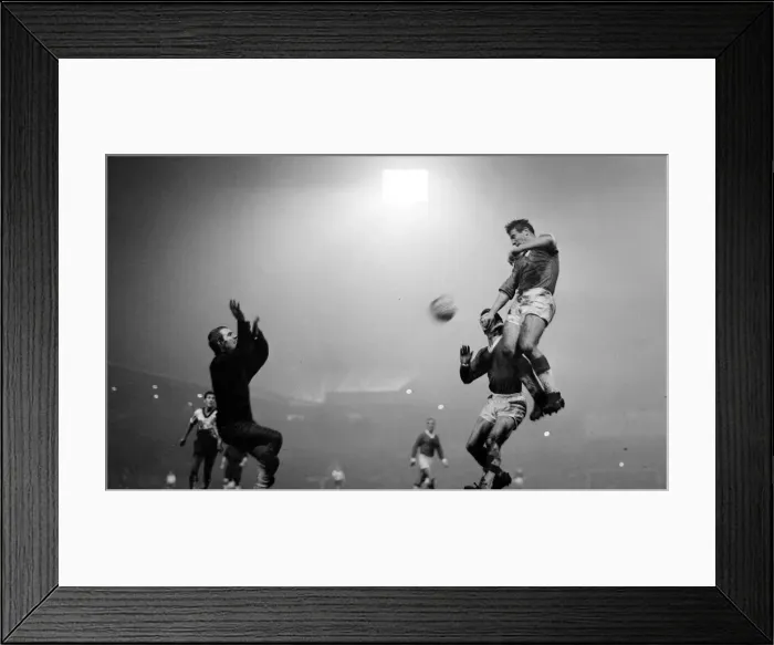 Framed Print : Manchester United versus Bayern Munich-Alex Dawson leaps up above Bayern