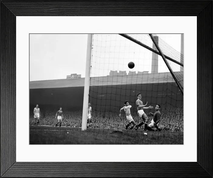 Framed Print : Dugdale the Villa centre-half fails to clear with a header and scores Man utd Framed Print : Dugdale the Villa centre-half fails to clear with a header and scores Man utd