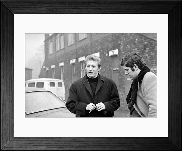 Framed Print : Manchester United Player Denis Law arrives for training February 1969