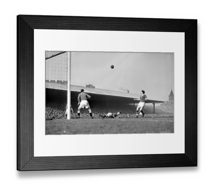Framed Print : Manchester United versus Cardiff City Roger Byrne heads almost into his own goal Framed Print : Manchester United versus Cardiff City Roger Byrne heads almost into his own goal