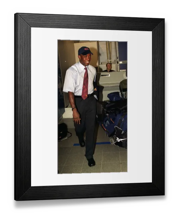 Framed Print : Dwight Yorke, Manchester United football player, pictured arriving at Manchester Airport Framed Print : Dwight Yorke, Manchester United football player, pictured arriving at Manchester Airport