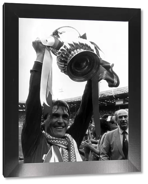 Kenny Dalglish, Liverpool player manager, celebrates after winning the FA Cup Final