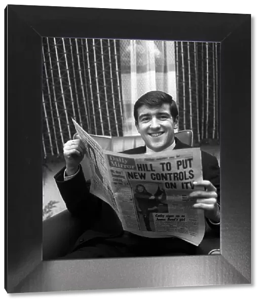 Terry Venables January 1964 at home reading the Daily Mirror