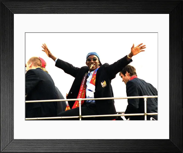 Framed Print : Dwight Yorke, Manchester United football player, enjoys open top bus parade in Manchester Framed Print : Dwight Yorke, Manchester United football player, enjoys open top bus parade in Manchester