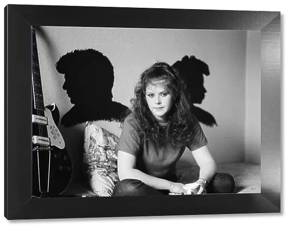 Kirsty MacColl - singer. Pictured at home in 1981. Kirsty Anna MacColl (10 October 1959 - 18 December 2000) was a British singer and songwriter. She recorded several pop hits in the 1980s and 1990s