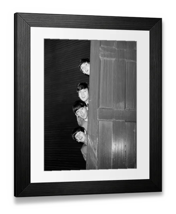 Framed Print : The Beatles peering out from behind a door. before the groups appearence at Sunday Night at the London Palladium, 13 October 1963. Top to bottom are: Paul McCartney, George Harrison, John Lennon, and Ringo Starr Framed Print : The Beatles peering out from behind a door. before the groups appearence at Sunday Night at the London Palladium, 13 October 1963. Top to bottom are: Paul McCartney, George Harrison, John Lennon, and Ringo Starr