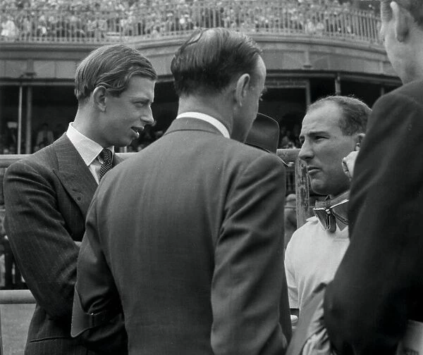 1 - STIRLING MOSS, RACING DRIVER, TALKS TO THE DUKE OF KENT BEFORE THE START OF THE GRAND