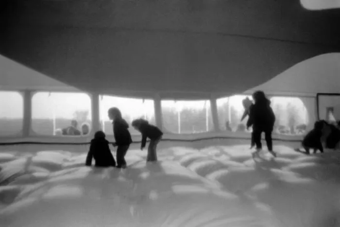Framed Print : 100 Foot Balloon: Children leap about inside the Whale Balloon