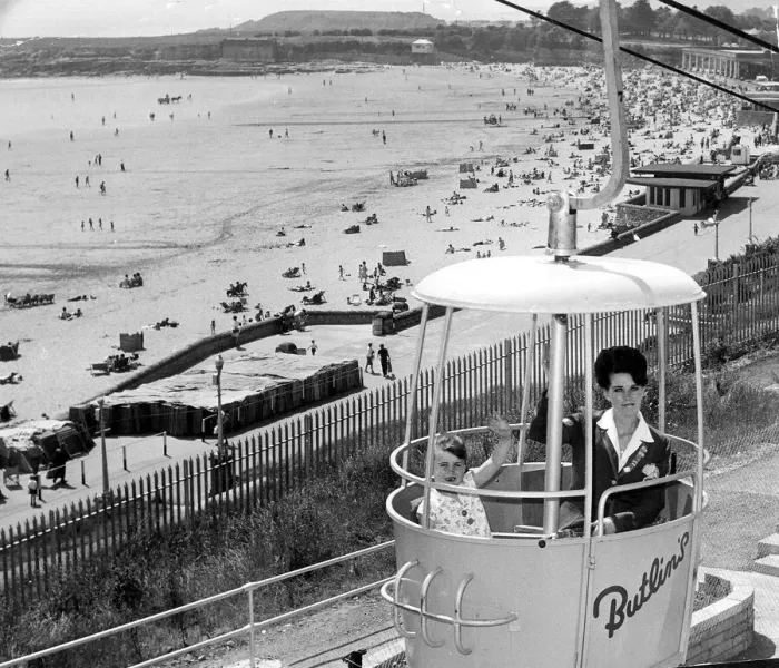 Framed Print : 13 June 1967 A redcoat and a camper enjoy a ride in the Butlins rope railway high above Framed Print : 13 June 1967 A redcoat and a camper enjoy a ride in the Butlins rope railway high above