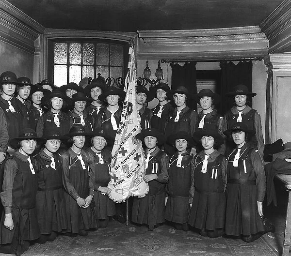 The 13th Camberwell Girl Guides are pictured holding the Princess Mary Standard