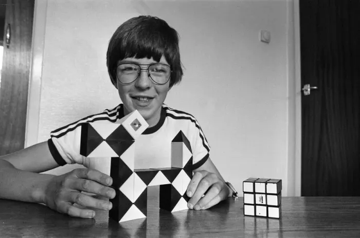 Framed Print : 14 year old Terence Wilson of Deepdale near Preston, with his Rubik cube and snake Framed Print : 14 year old Terence Wilson of Deepdale near Preston, with his Rubik cube and snake