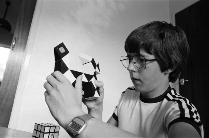 Framed Print : 14 year old Terence Wilson of Deepdale near Preston, with his Rubik cube and snake Framed Print : 14 year old Terence Wilson of Deepdale near Preston, with his Rubik cube and snake