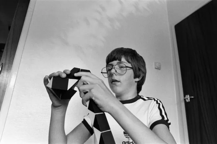 Framed Print : 14 year old Terence Wilson of Deepdale near Preston, with his Rubik snake Framed Print : 14 year old Terence Wilson of Deepdale near Preston, with his Rubik snake