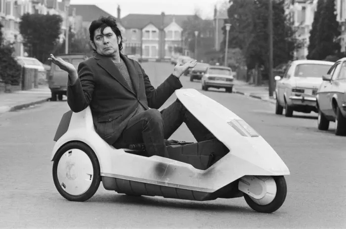Framed Print : 15 stone Roy Stuart of Ilford, Essex, owner of a C5, can only get six miles out of his Framed Print : 15 stone Roy Stuart of Ilford, Essex, owner of a C5, can only get six miles out of his