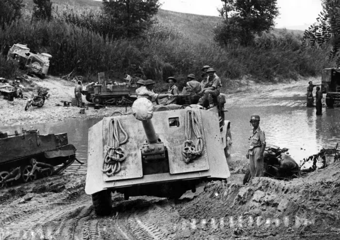 Framed Print : A 17-pdr anti-tank gun of 269 Battery, 87th Anti-Tank Regiment is towed across the River Framed Print : A 17-pdr anti-tank gun of 269 Battery, 87th Anti-Tank Regiment is towed across the River