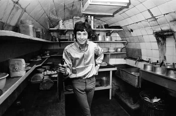 Framed Print : 18-year-old Cat Stevens in the kitchen of his Dads restaurant in Shaftesbury Avenue
