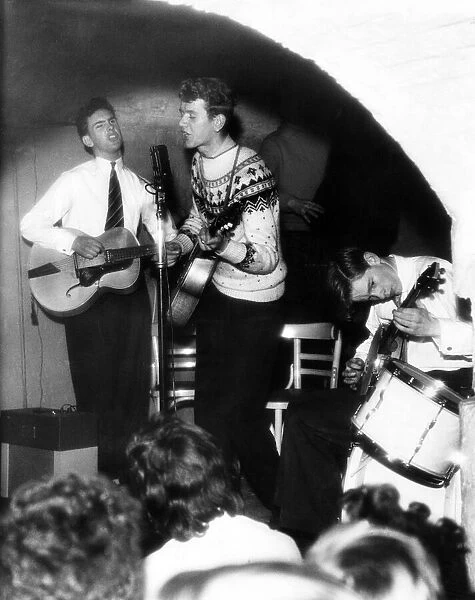 18 year old Colin Rimmer of Holylake singing with the Coney Island Skiffle Group in The
