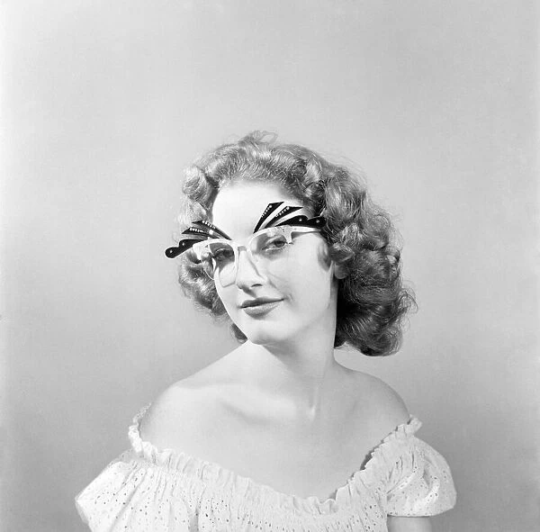 18 Yrs old actress Shirley Lorimer displaying the spectacles. May 1953 D2541