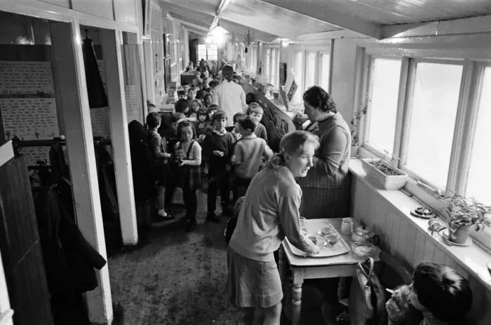 Framed Print : Some of the 180 children play in the small corridor at Sacred Heart RC school, Gorton Framed Print : Some of the 180 children play in the small corridor at Sacred Heart RC school, Gorton