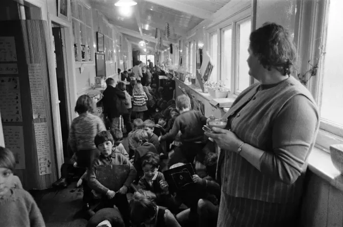 Framed Print : Some of the 180 children play in the small corridor at Sacred Heart RC school, Gorton