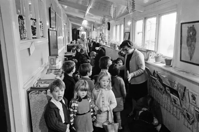 Framed Print : Some of the 180 children play in the small corridor at Sacred Heart RC school, Gorton Framed Print : Some of the 180 children play in the small corridor at Sacred Heart RC school, Gorton