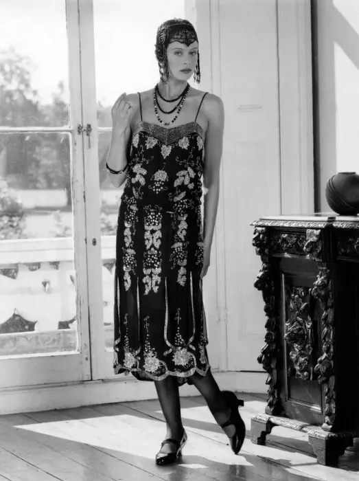 Framed Print : 1920s fashions: Beaded flapper dress and skull cap with neat T-bar shoes