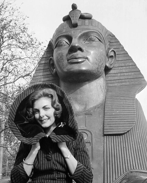 1959 Miss World Contestant poses in front of the Sphynx on the Embankment of the River