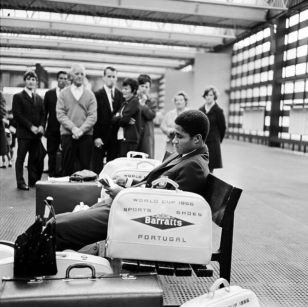 1966 World Cup Tournament in England. Portugal star Eusebio surrounded by autograph