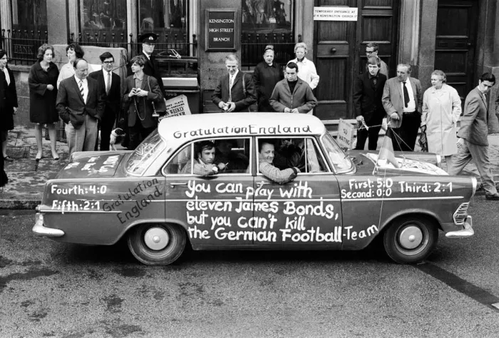Framed Print : 1966 World Cup Tournament in England. A West German car with the message