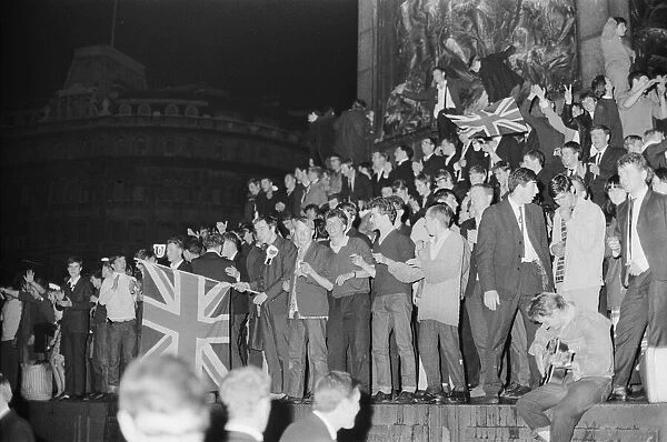 1966 World Cup Tournament in England. England fans celebrate in Trafalgar Square in