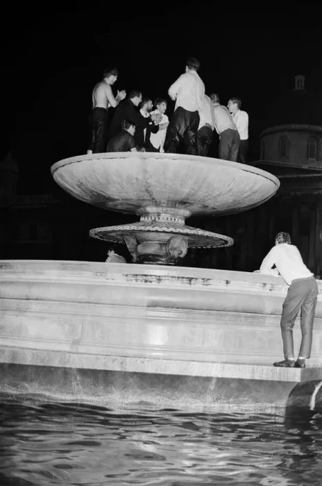 Framed Print : 1966 World Cup Tournament in England. England fans celebrate in the fountains in