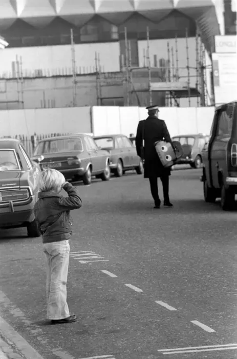 Framed Print : 1975 Brighton Toy Fair. Small boy cries as Traffic Warden confiscate toy pedal car for Framed Print : 1975 Brighton Toy Fair. Small boy cries as Traffic Warden confiscate toy pedal car for