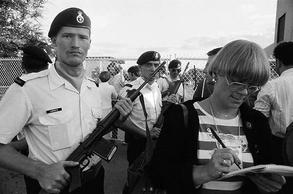 The 1976 Summer Olympics in Montreal, Canada. Pictured, troops bar press entering