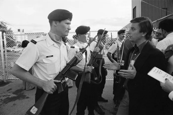 Framed Print : The 1976 Summer Olympics in Montreal, Canada. Pictured, troops bar press entering Framed Print : The 1976 Summer Olympics in Montreal, Canada. Pictured, troops bar press entering