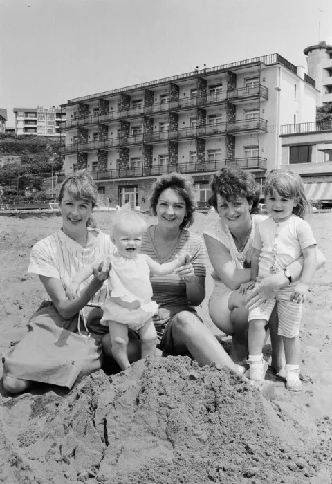 Framed Print : 1982 World Cup Finals in Spain. English fans on the beach with their children Framed Print : 1982 World Cup Finals in Spain. English fans on the beach with their children