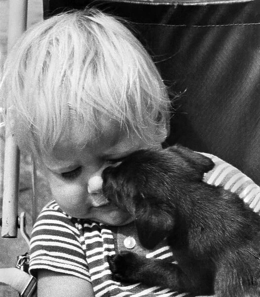 2 year old Jason Swain, of Erith, Kent, was given his first puppy