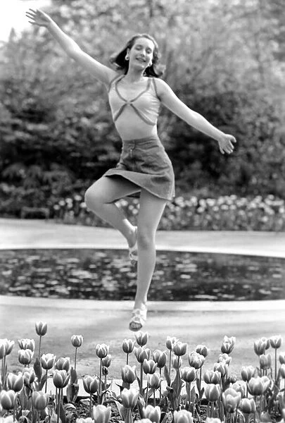 21 years old Marie France dancing amongst the tulips in her local park