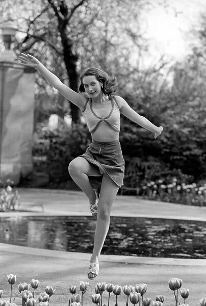 21 years old Marie France dancing amongst the tulips in her local park