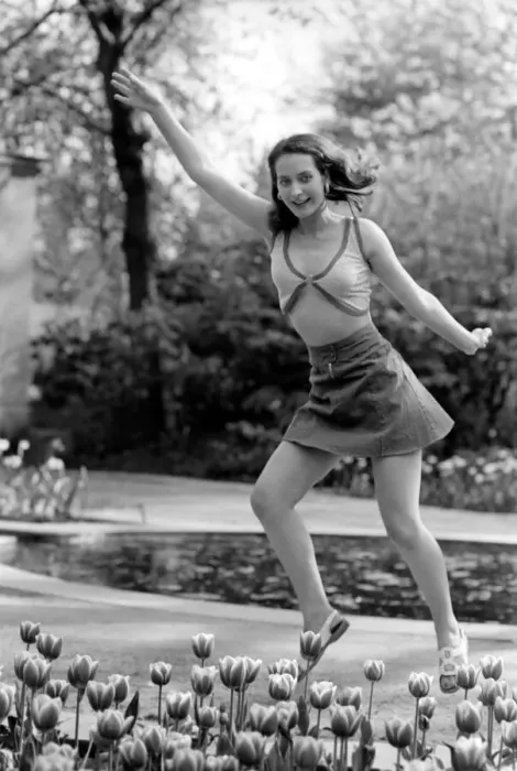 Framed Print : 21 years old Marie France dancing amongst the tulips in her local park Framed Print : 21 years old Marie France dancing amongst the tulips in her local park
