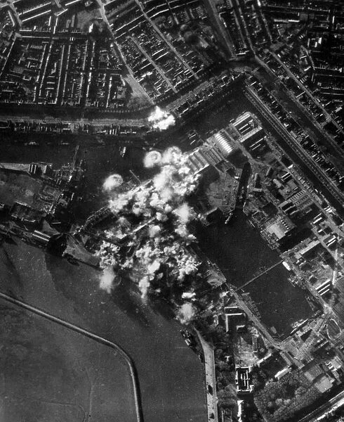At least 36 bombs explode during a successful raid on the docks at Den Helder in Holland